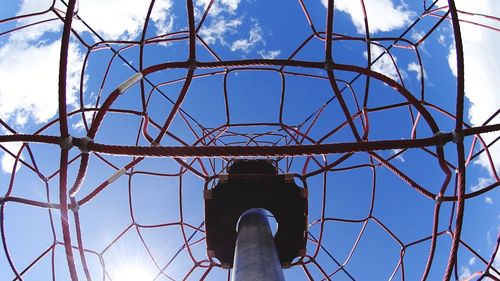 Low angle view of tower against cloudy sky