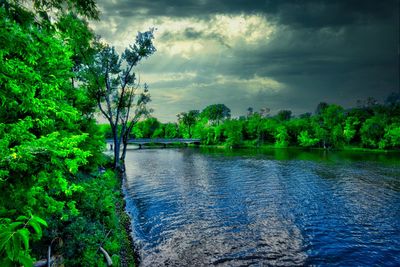 Scenic view of river against sky