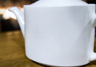 Close-up of coffee cup on table