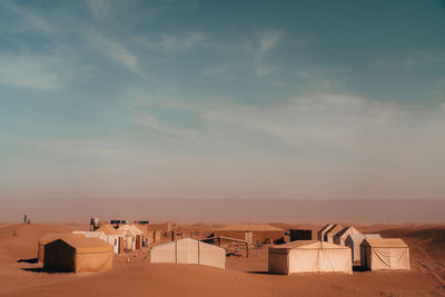 Scenic view of beach against sky during sunset