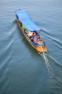 High angle view of people on boat in river