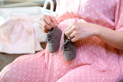 Midsection of woman working