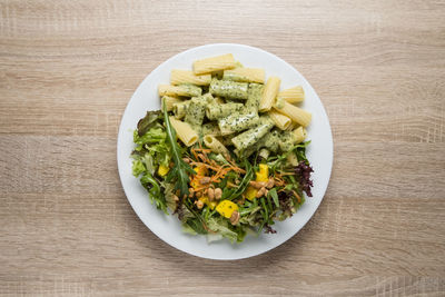 High angle view of chopped vegetables in bowl on table