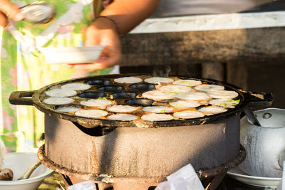 Close-up of preparing food in kitchen