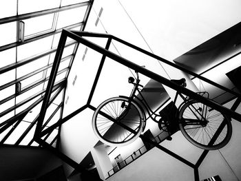 Low angle view of bicycle against building