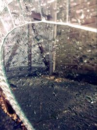 Close-up of raindrops on glass window