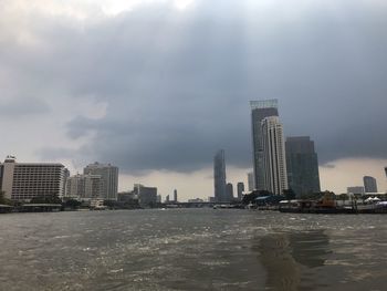 Modern buildings in city against sky