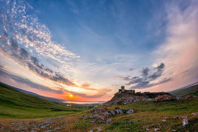 Scenic view of landscape against sky during sunset