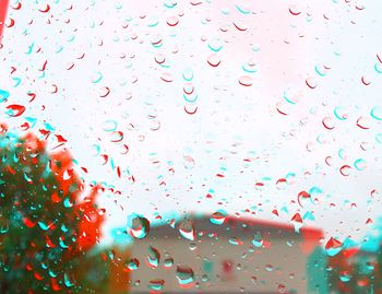Close-up of water drops on glass window
