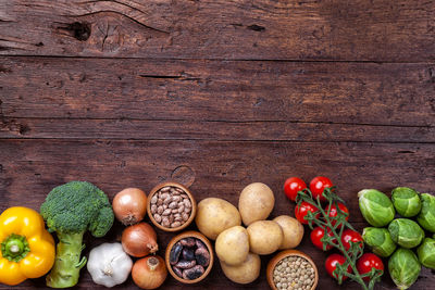 Directly above shot of various fruits on wood