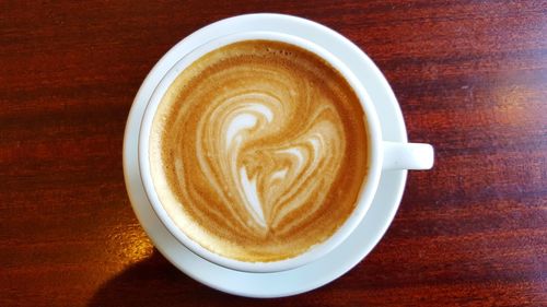 Directly above shot of cappuccino on table
