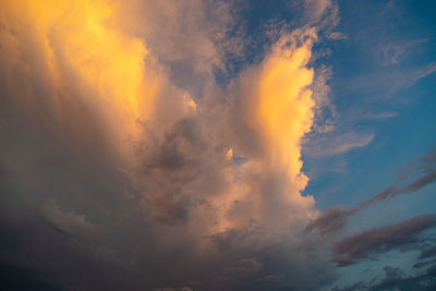 Low angle view of dramatic sky during sunset