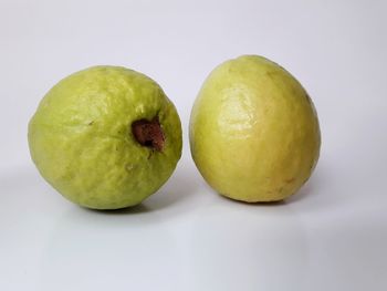 Close-up of apple against white background