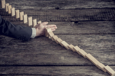 High angle view of people on wooden table