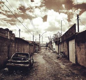 Car in city against sky