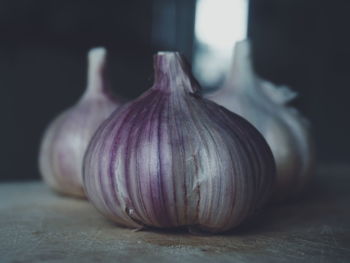 Close-up of garlic on cutting board