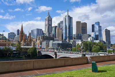 Buildings in city against sky