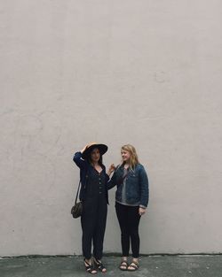 Friends standing on ground