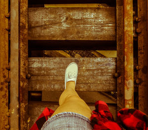 Low section of man standing on floor