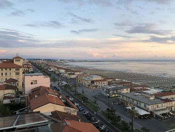 High angle view of townscape against sky at sunset