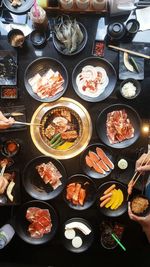 High angle view of people eating food