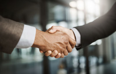 Close-up of business people shaking hands