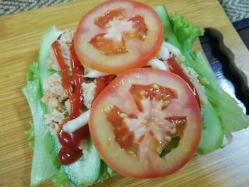 High angle view of vegetables on cutting board