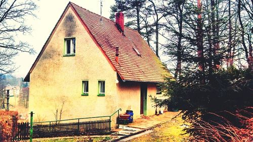 Houses with trees in background