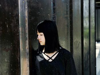 Close-up of young woman standing outdoors