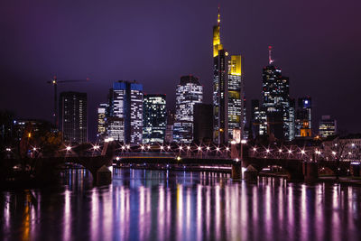 Illuminated city lit up at night