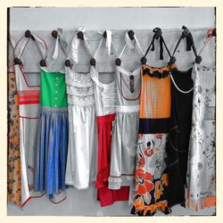 Colorful clothes hanging in row