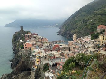 High angle view of townscape by sea