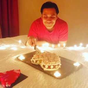 Young woman sitting on table