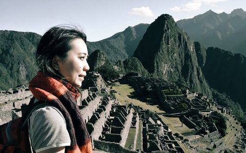 Woman standing on mountain