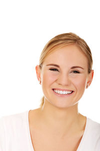 Portrait of a smiling young woman over white background