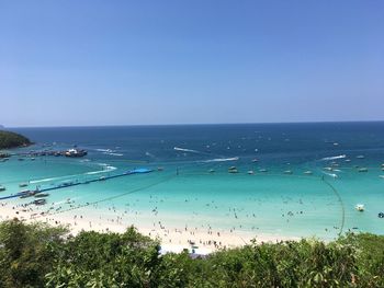 Scenic view of sea against clear blue sky