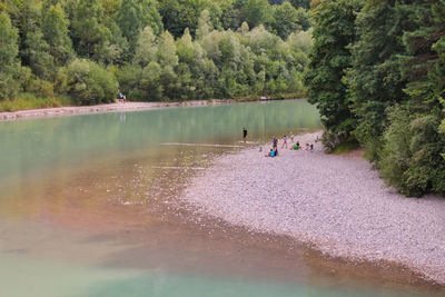 Scenic view of lake against trees