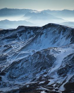 Scenic view of snowcapped mountains against sky,italy