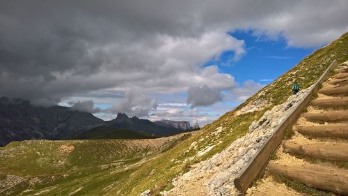 Panoramic view of road amidst mountains against sky