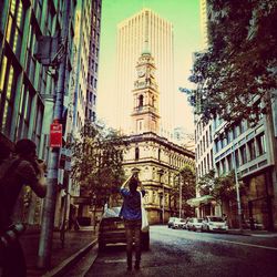 Woman walking on city street