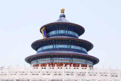 Low angle view of temple building against clear sky