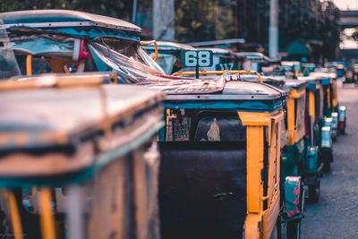 Vehicles parked on road in city