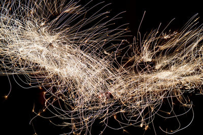 Close-up of firework display at night