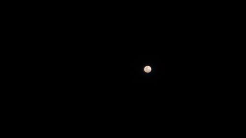 Scenic view of moon against sky at night