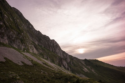 Low angle view of mountain against sky during sunset