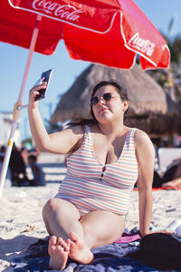 Young woman using mobile phone