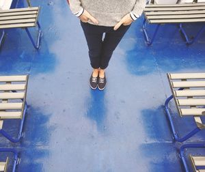 Low section of man standing on floor