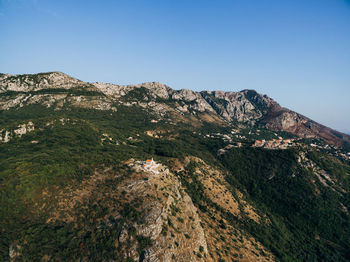 Scenic view of mountains against clear sky