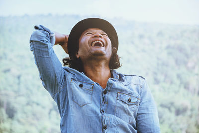 Happy man looking away