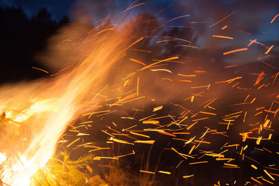 Close-up of firework display at night